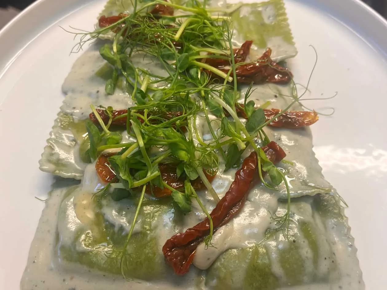 Spinach Ravioli with Buffalo Ricotta and Spinach in Cheese Sauce
