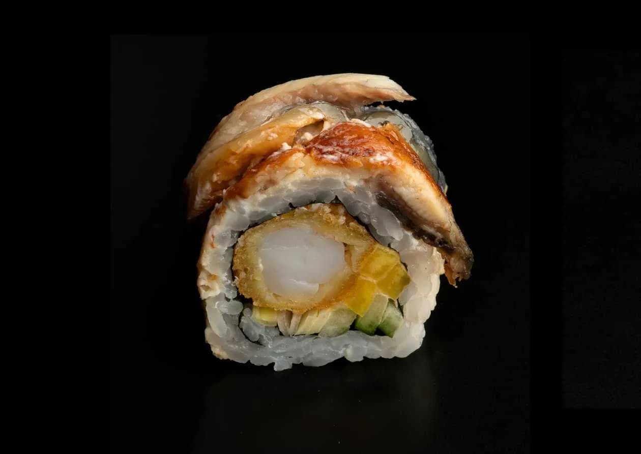 Gold uramaki tempura shrimp wrapped in eel