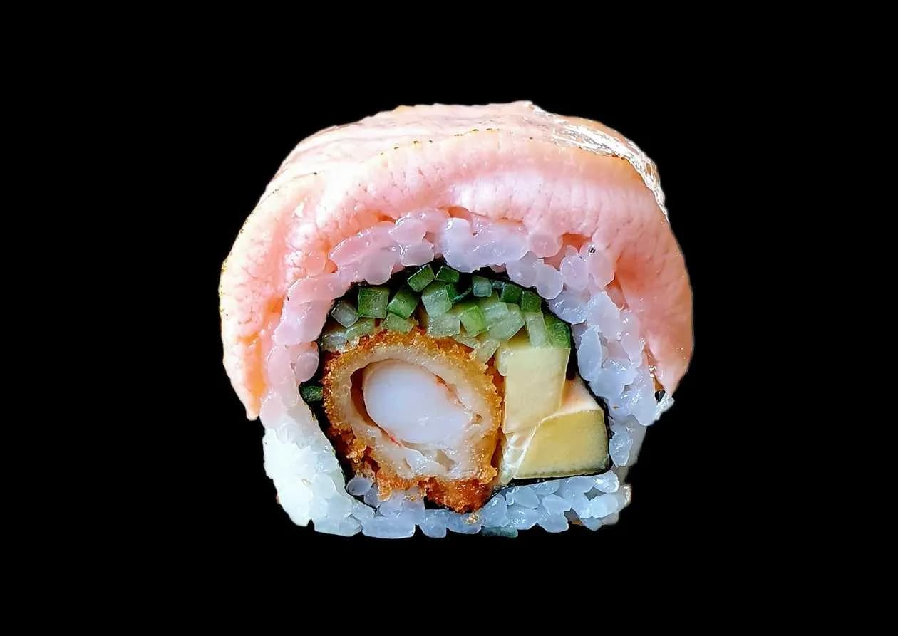 Uramaki gold tempura shrimp wrapped in fired salmon