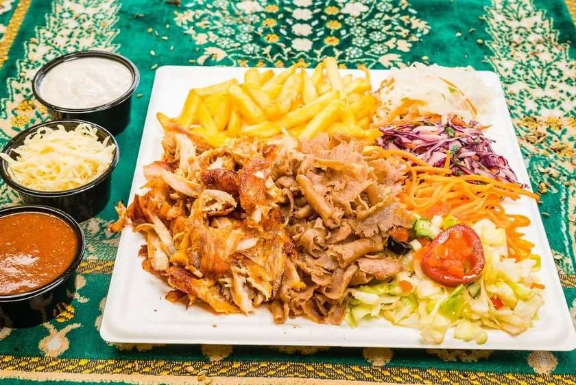 Kebab on a Plate with mixed meat and cheese