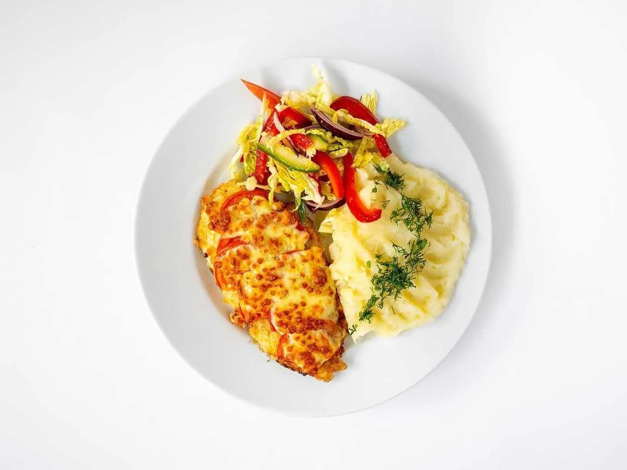 Chicken Breast Stuffed with Chanterelles and Onions with a Hint of Cheese Sauce