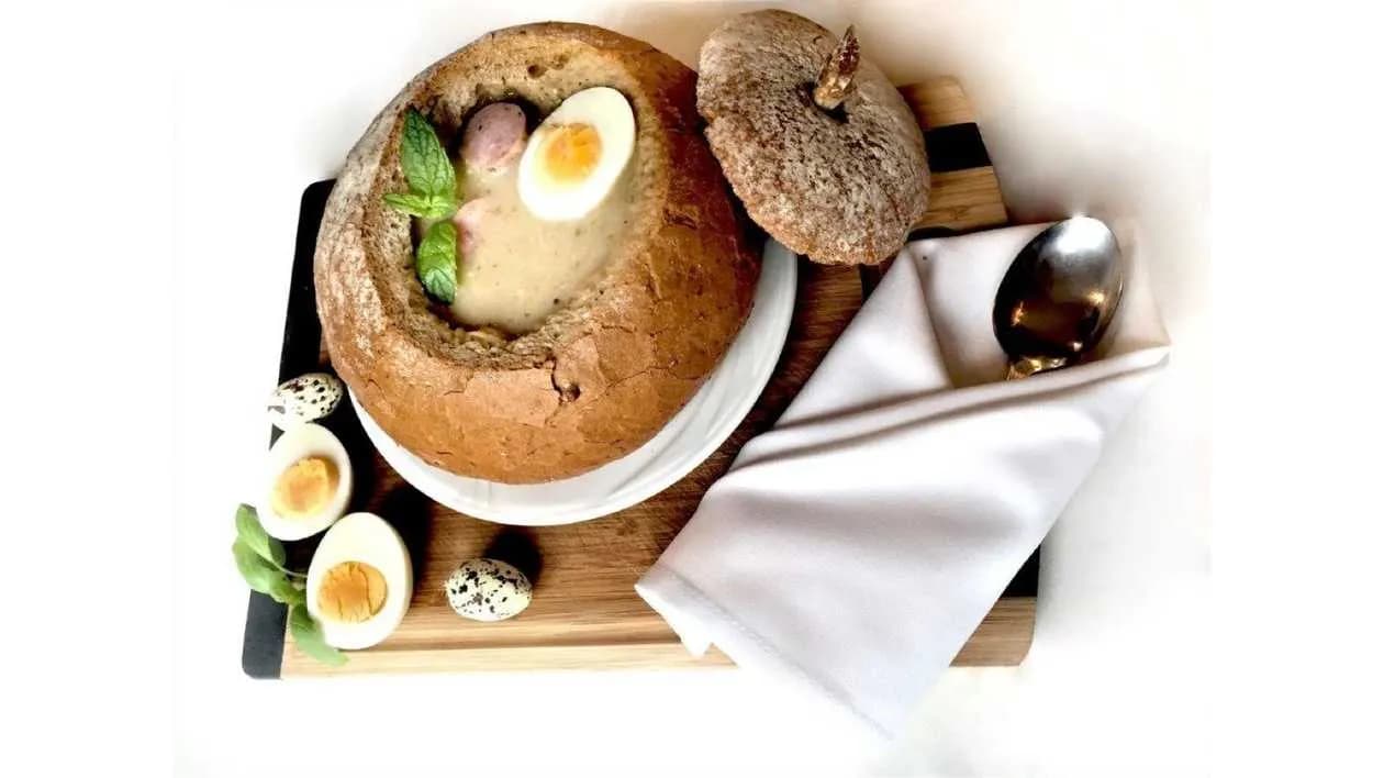 Sour rye soup with sausage and egg