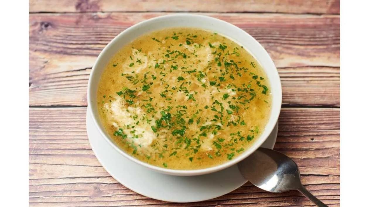 Broth with poured dumplings