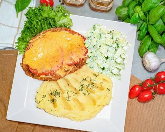 Kotlet Schabowy Zapiekany z Serem