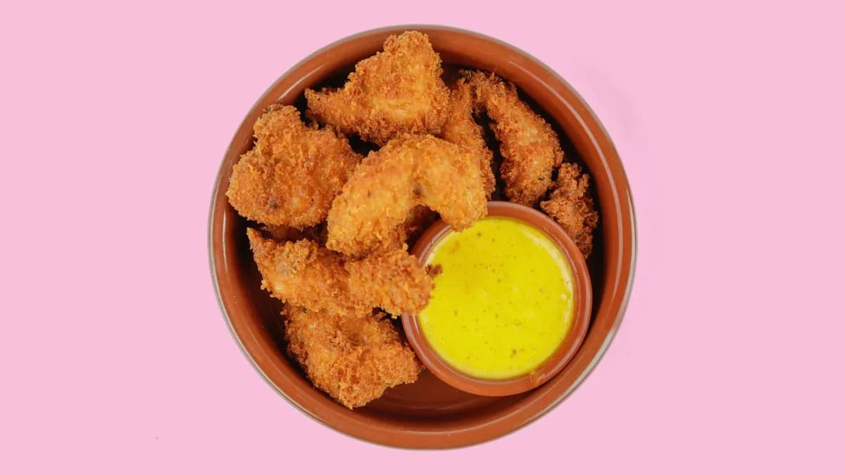 34. Pavo Empanado con Salsa Curry