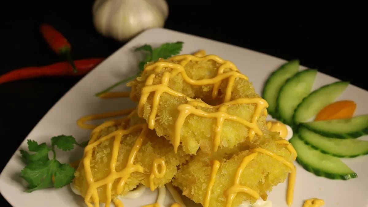 Sült tintahal ropogós panírban,édes-savanyú szósszal  5db (muc chien xu)