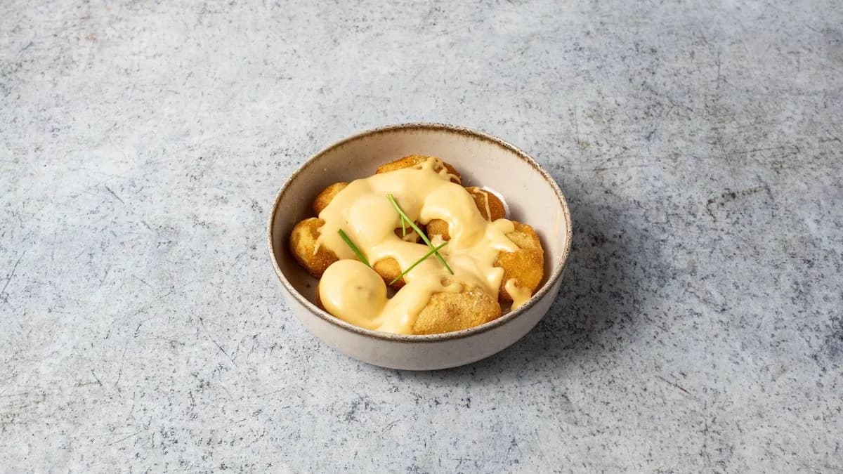 Sült parázsburgonya olvasztott cheddar sajttal