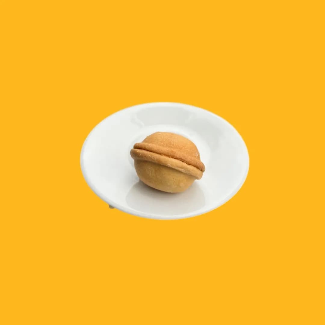 Orzeszek z nadzieniem z mleka skondensowanego i orzeszków