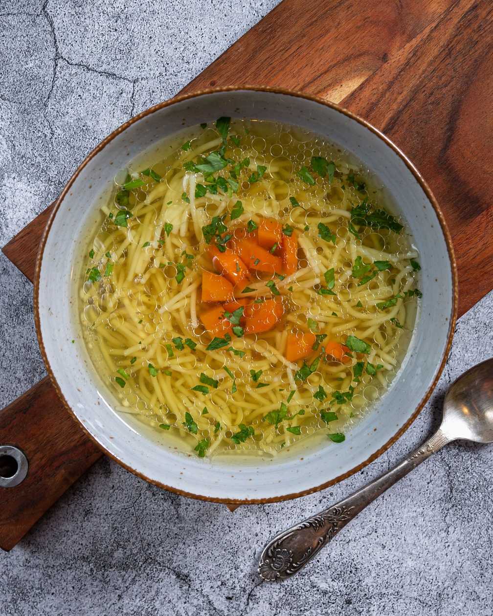 Chicken soup with duck and noodles