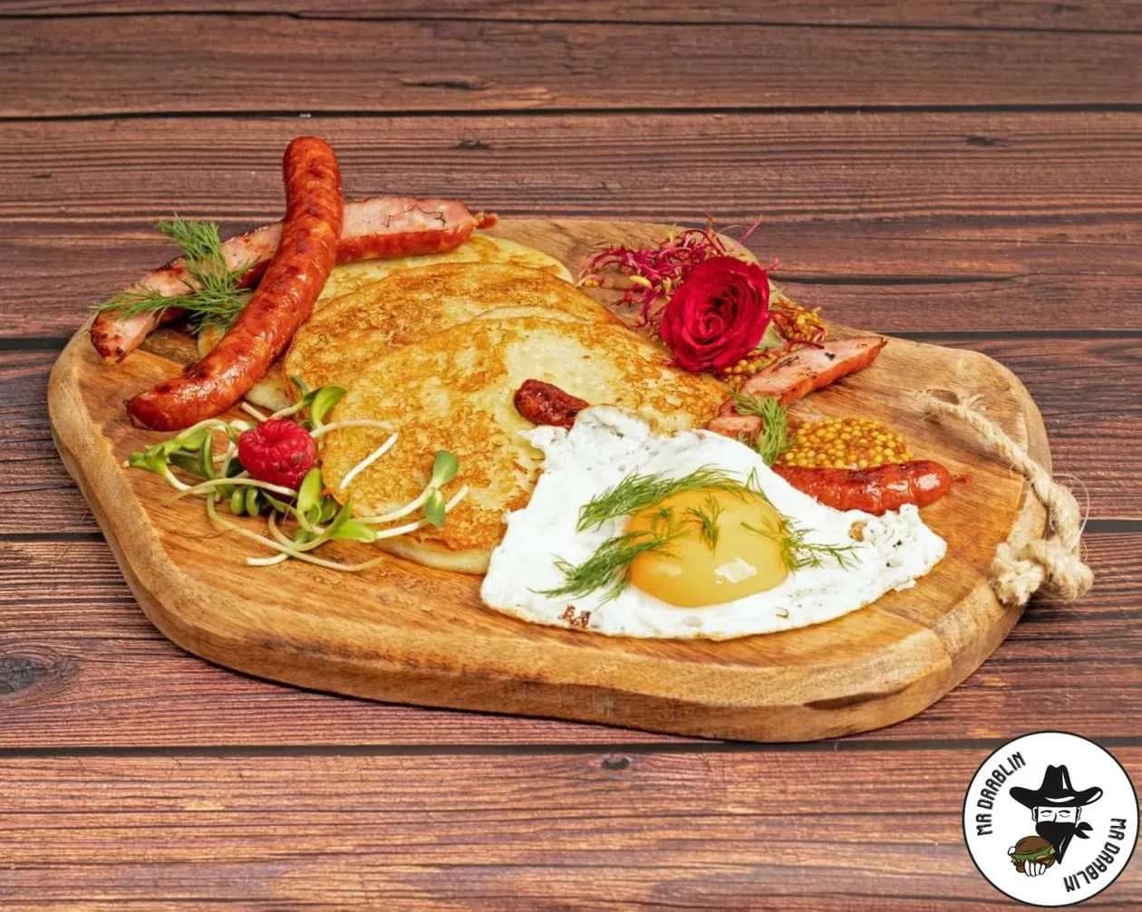 Potato Pancakes, Fried Egg, Grilled Frankfurters, Dijon Mustard, Micro Herbs