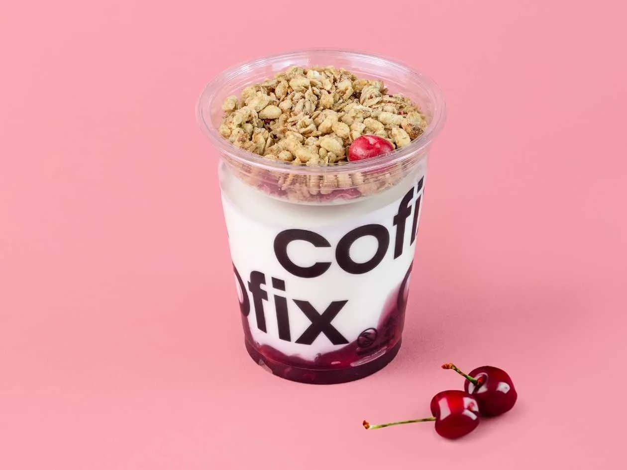 Yogurt with granola and cherries