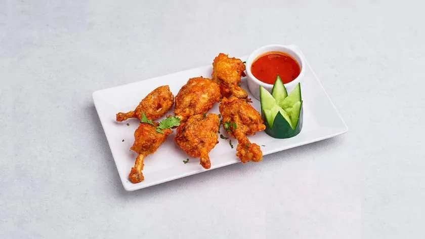 Chicken lollipop z frytkami 8 szt.