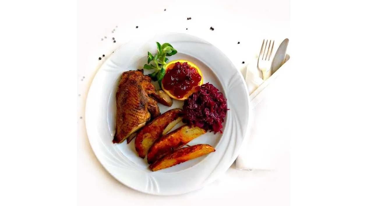 Loose roast duck in old Polish style with apples, fried beetroots