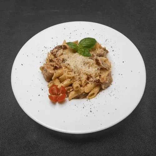 Penne with chicken and champignons with cheese sauce & parmesan