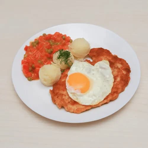 Turkey schnitzel with fried egg