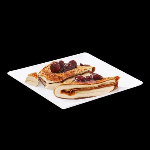 Crepes with mascarpone and cherries in wine