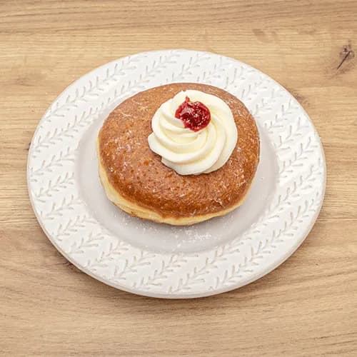 Raspberry donut with whipped cream
