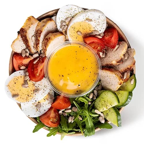 Salad with roast chicken and egg