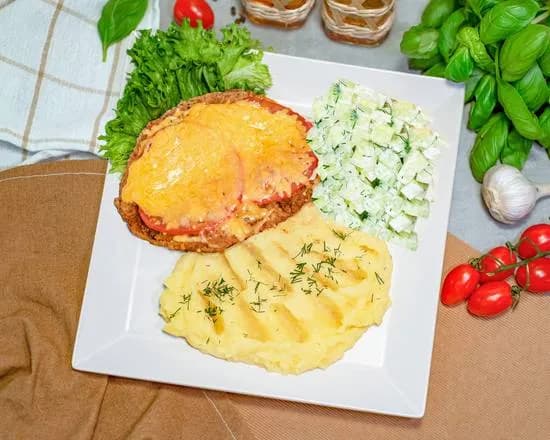 Kotlet Schabowy Zapiekany z Serem