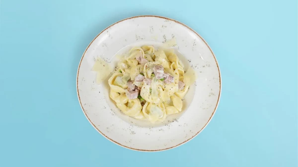 54. Tortellini Prosciutto e Panna