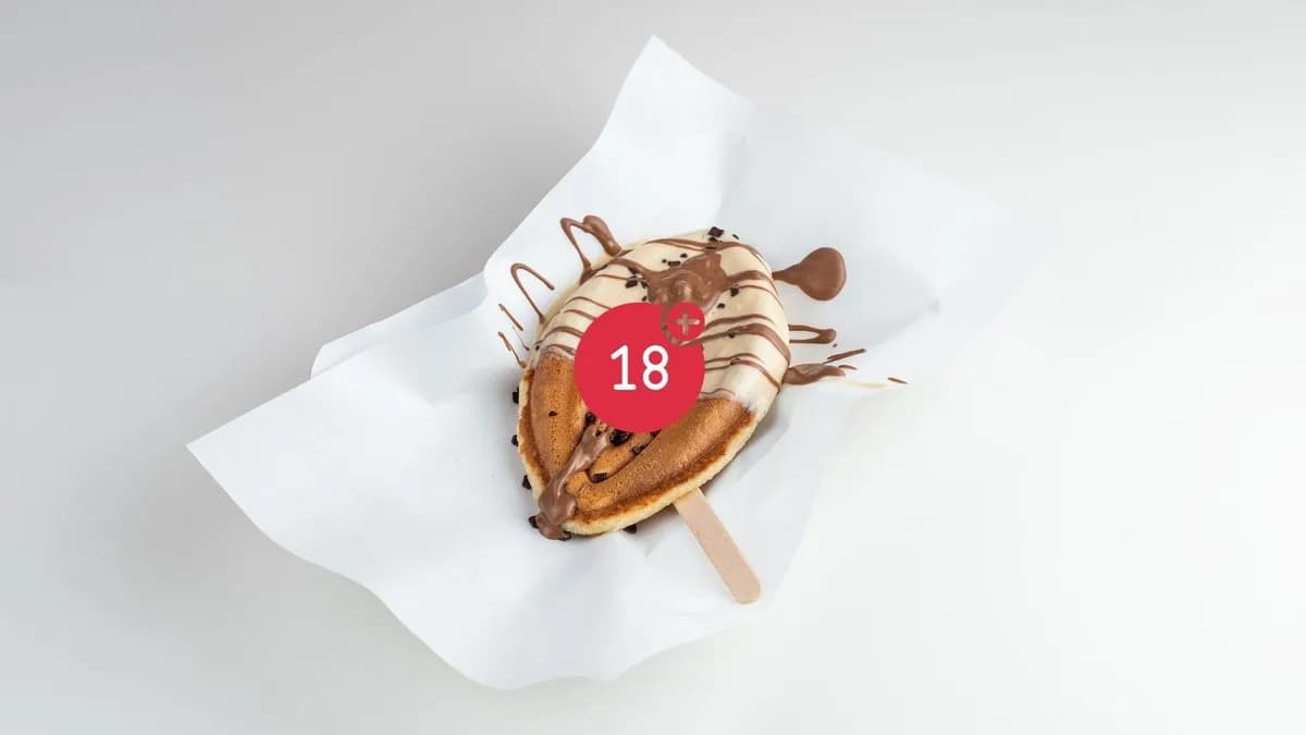 Pussy Waffle white chocolate sauce