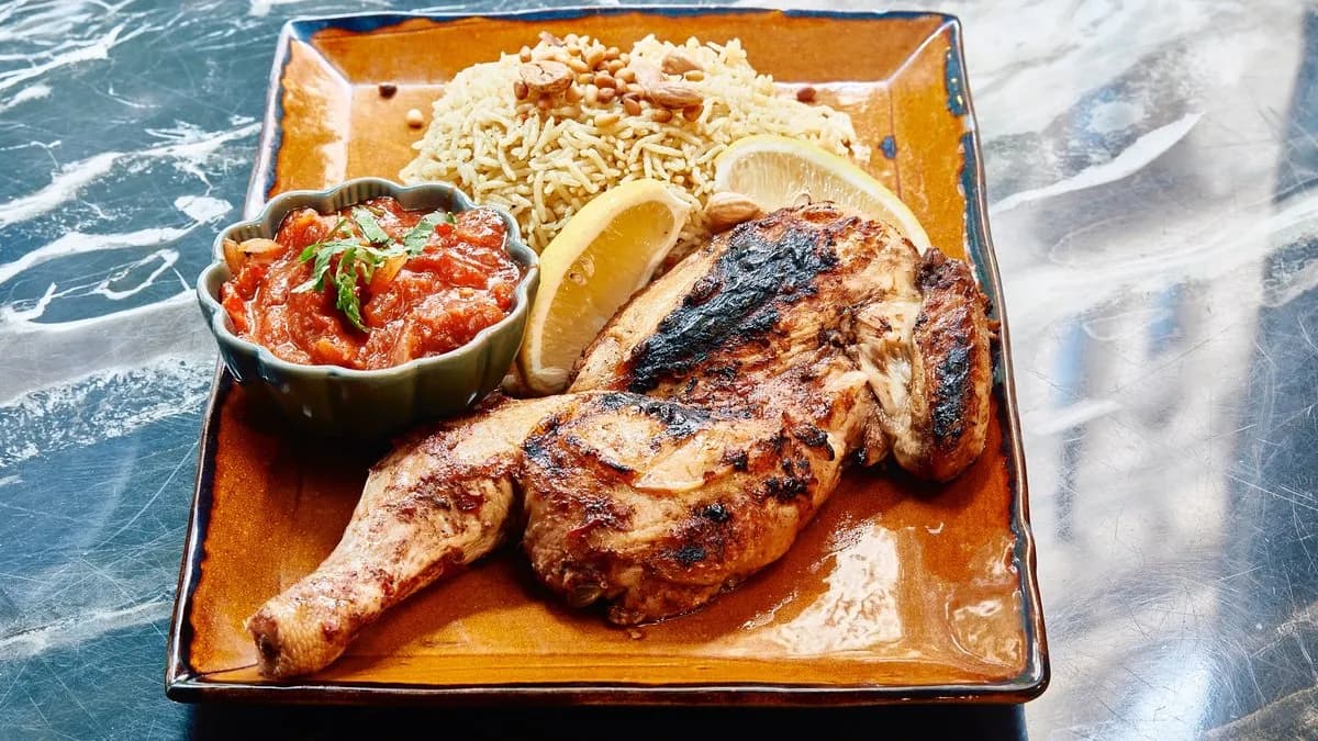 Mandi chicken with spicy fresh coriander and tomato sauce