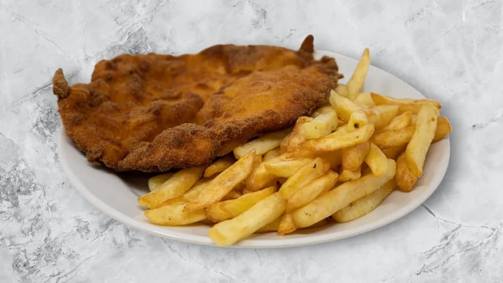 Rántott csirkemell körettel