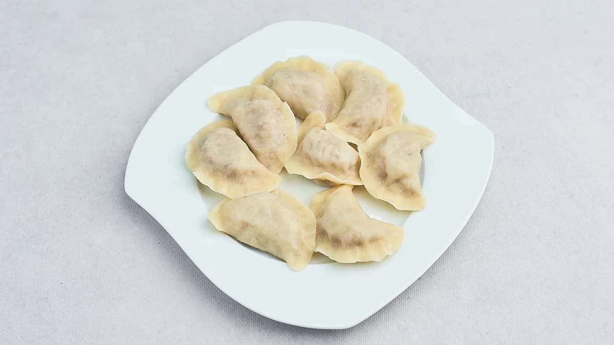 Pierogi z kapustą i pieczarkami