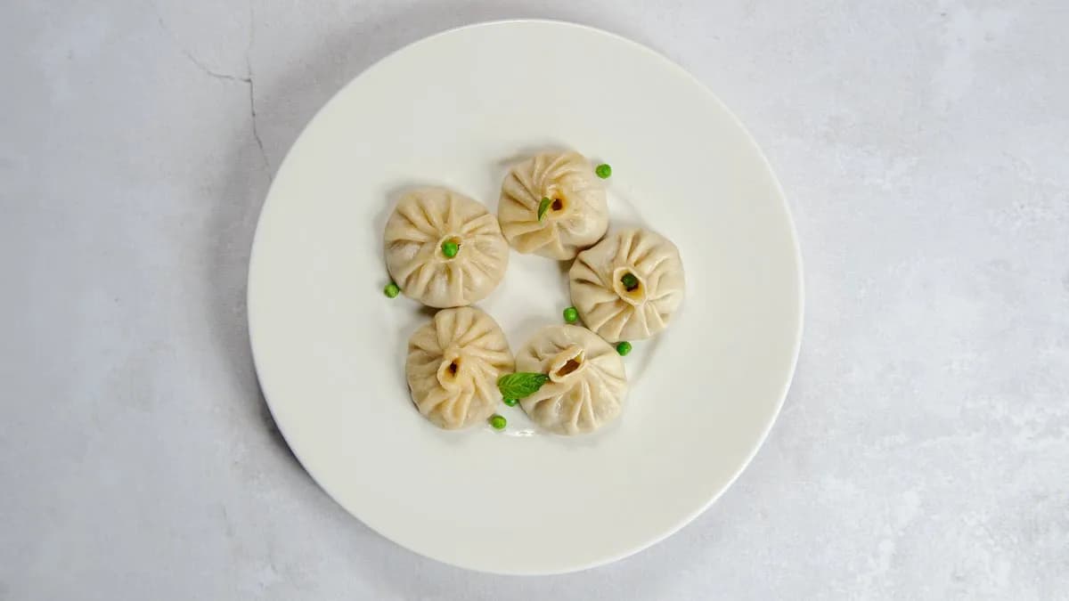 Xiao Long Bao z wieprzowiną, szczypiorem i kolendrą