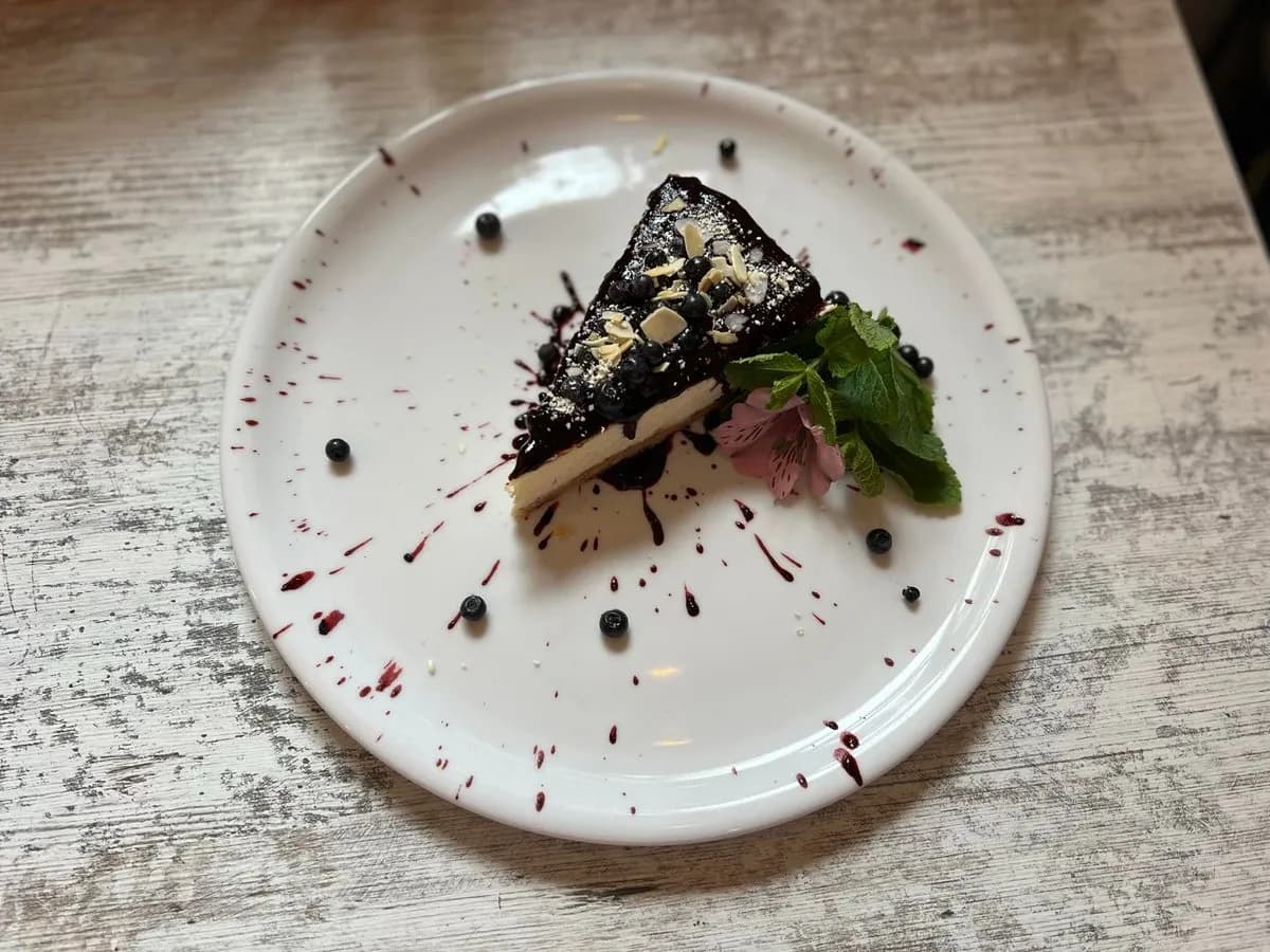 Cheesecake with cherry.