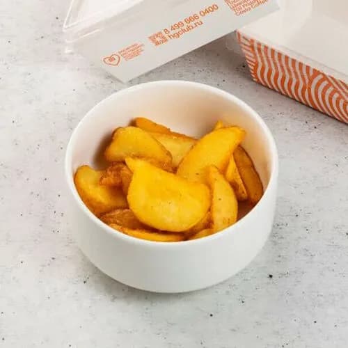 Дольки печёного картофеля