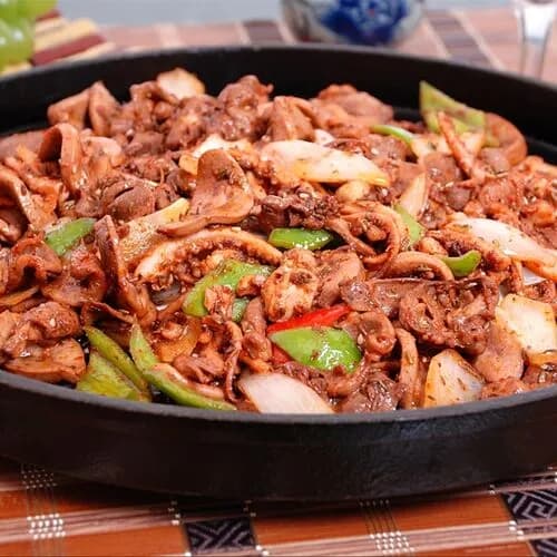 Обжаренные куриные внутренности с тмином