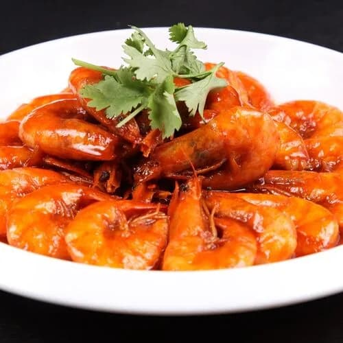 Жареные креветки в томатном соусе