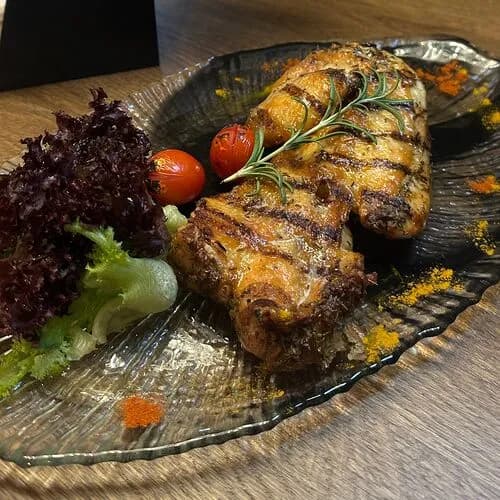 Половина цыплёнка на гриле