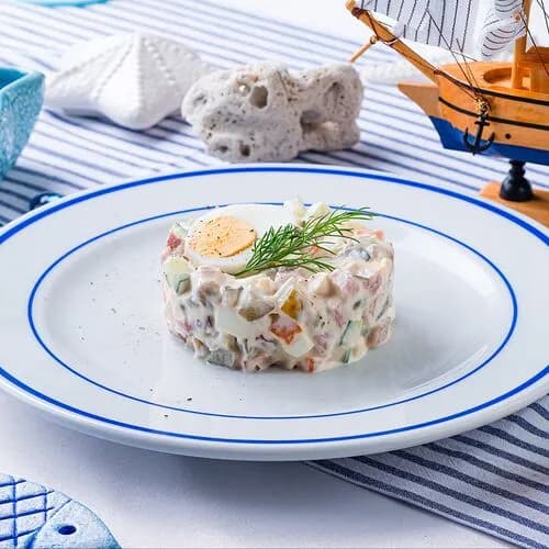 Оливье по-городскому с ветчиной